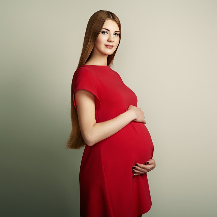 portrait of the young pregnant woman