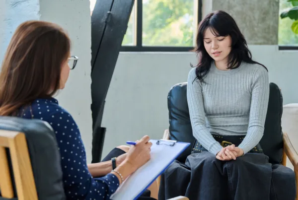 Signs of Autism in Adults discuss psychologist with adult